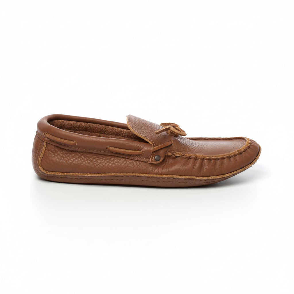 Brown leather moccasin shoe on a white background