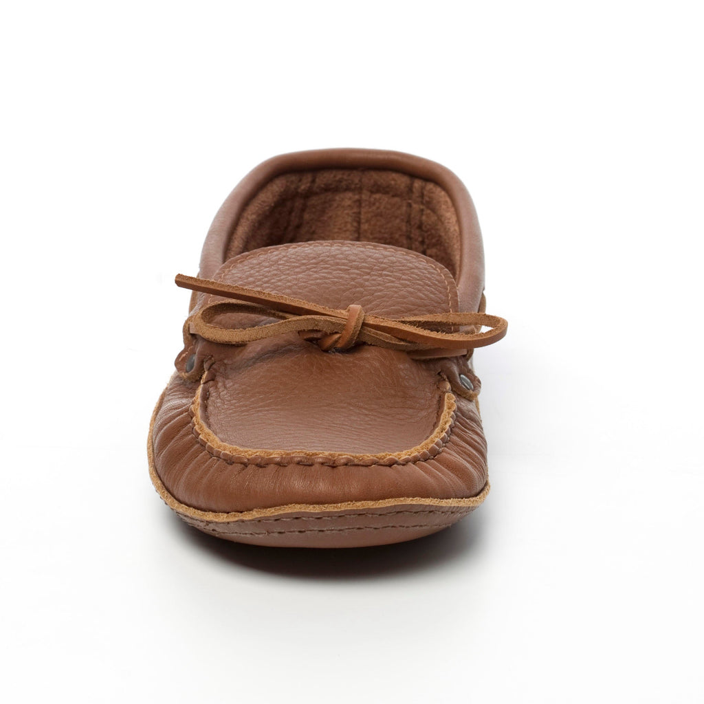 Brown leather moccasin shoe on a white background