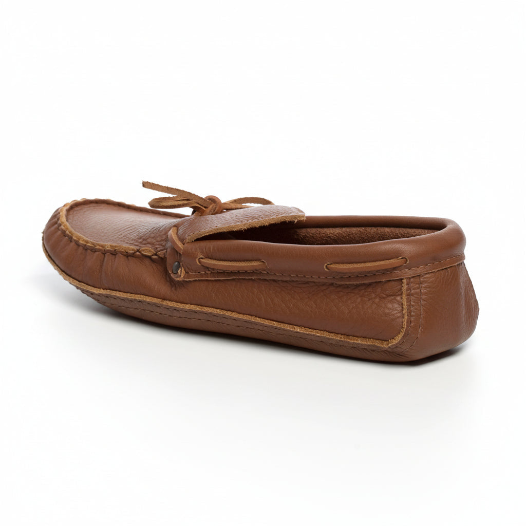 Brown leather moccasin shoe on a white background