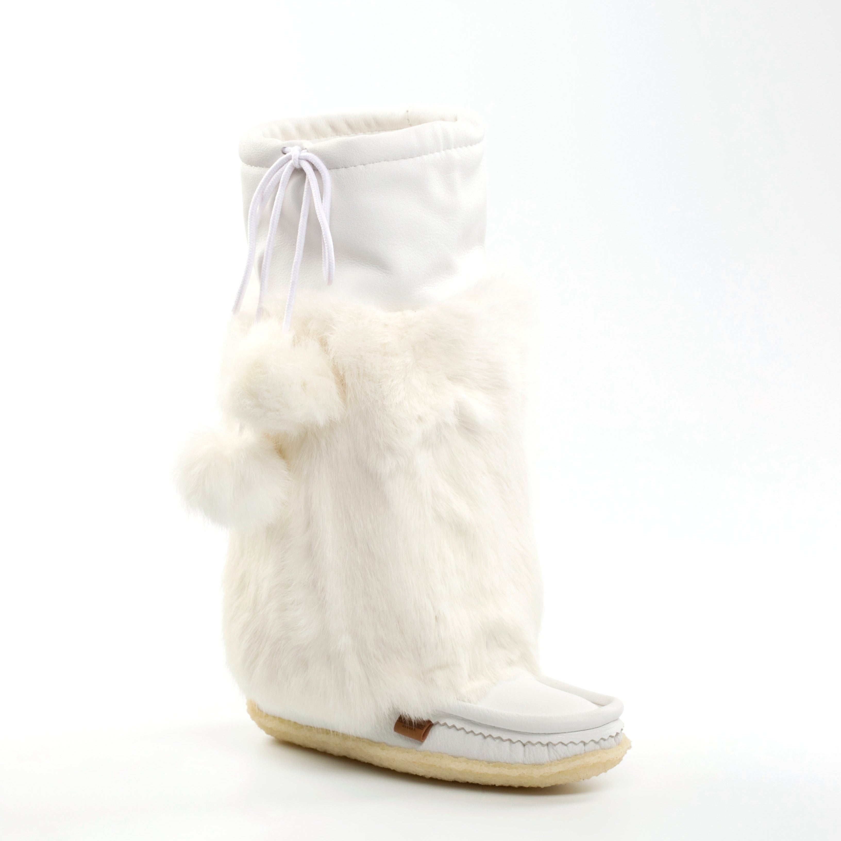 White boot with fur trim on a white background