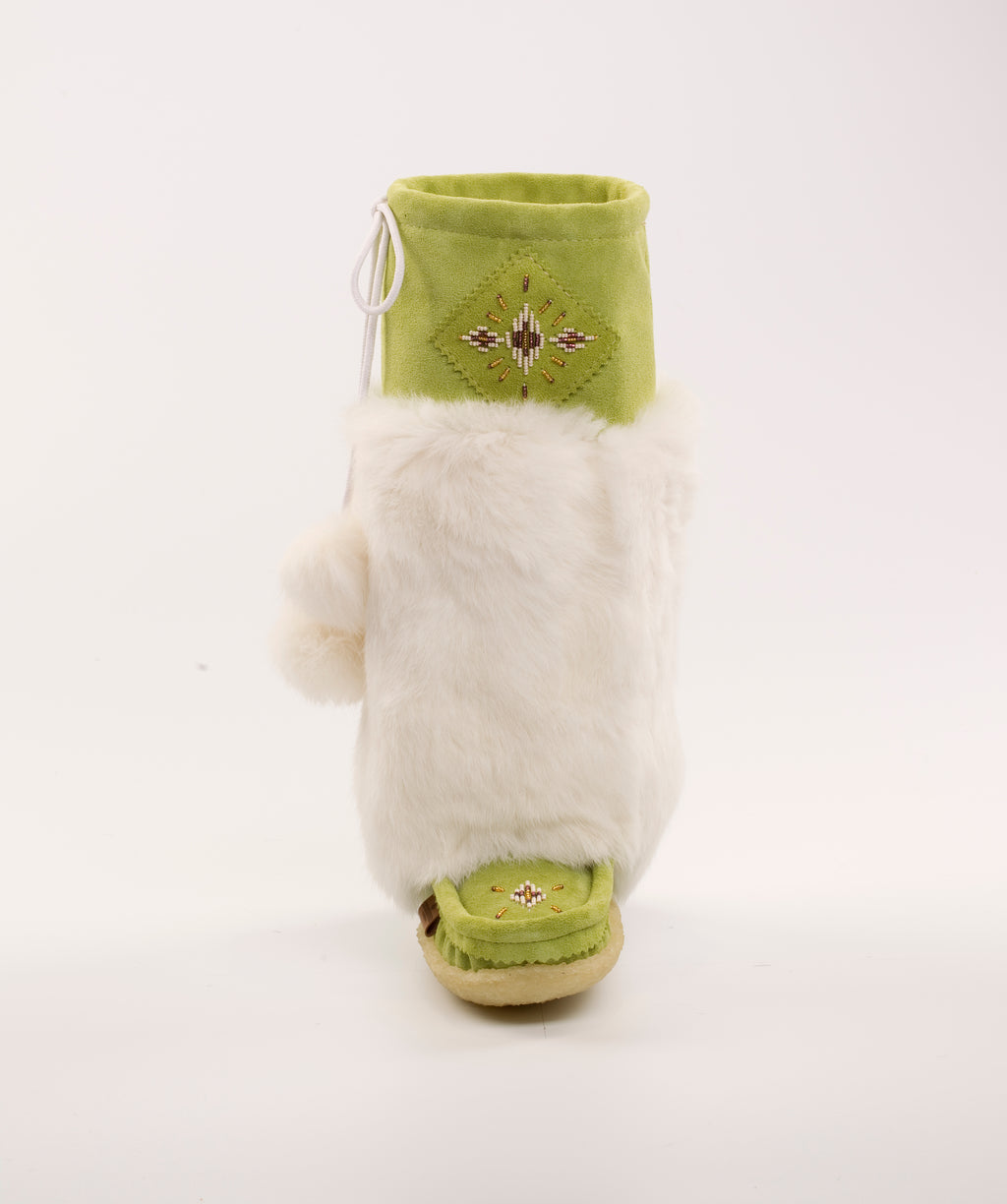 apple green mukluks being worn by a model