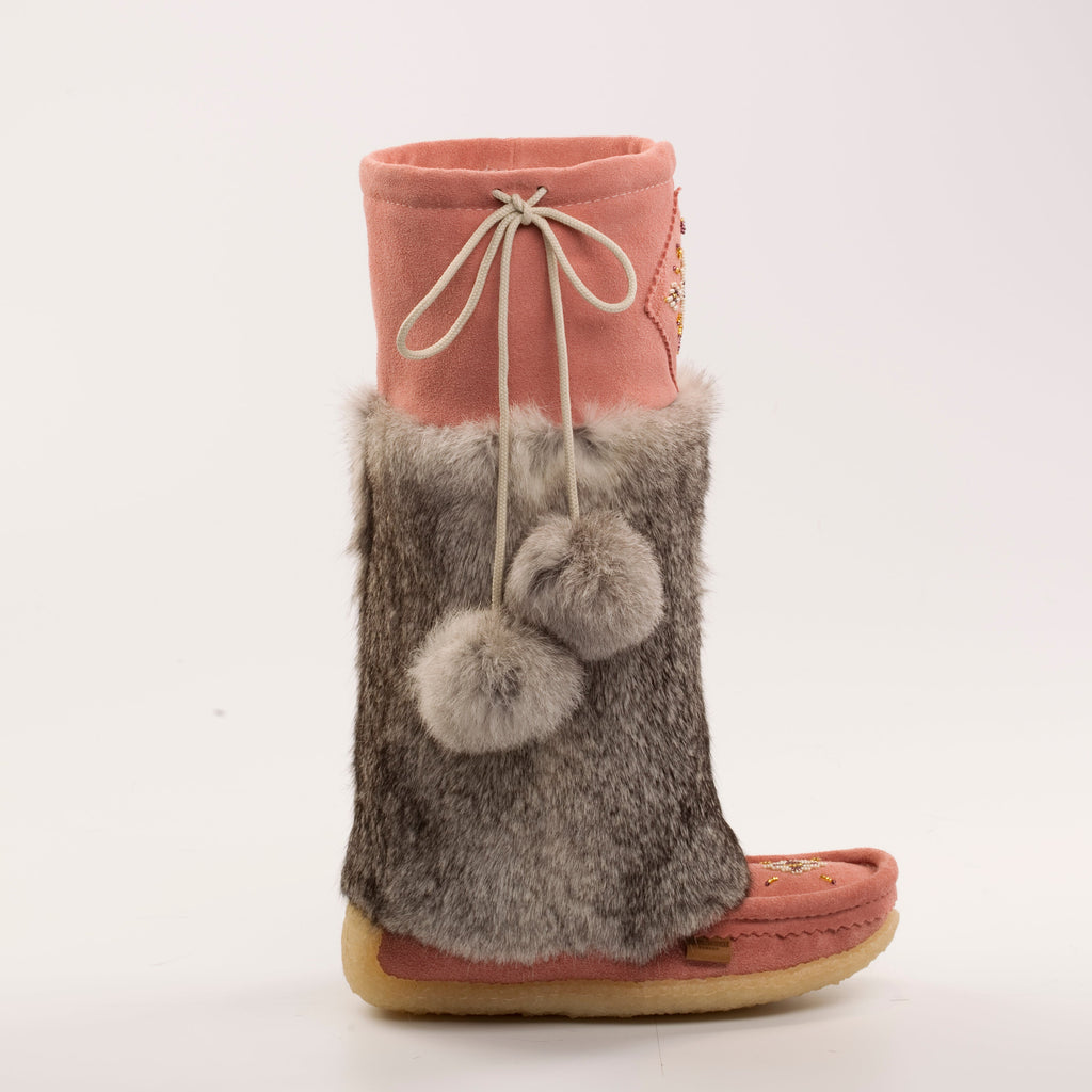 Pink boot with gray fuzzy top and pom-poms on a white background