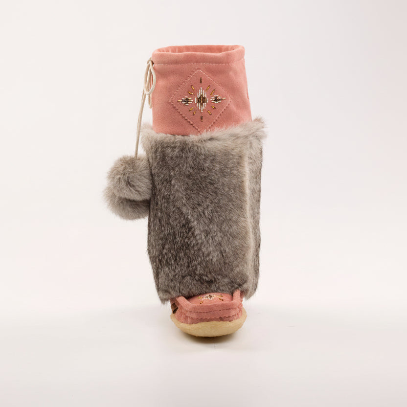 Pair of mukluks with pink top and gray mid-shaft on a white background