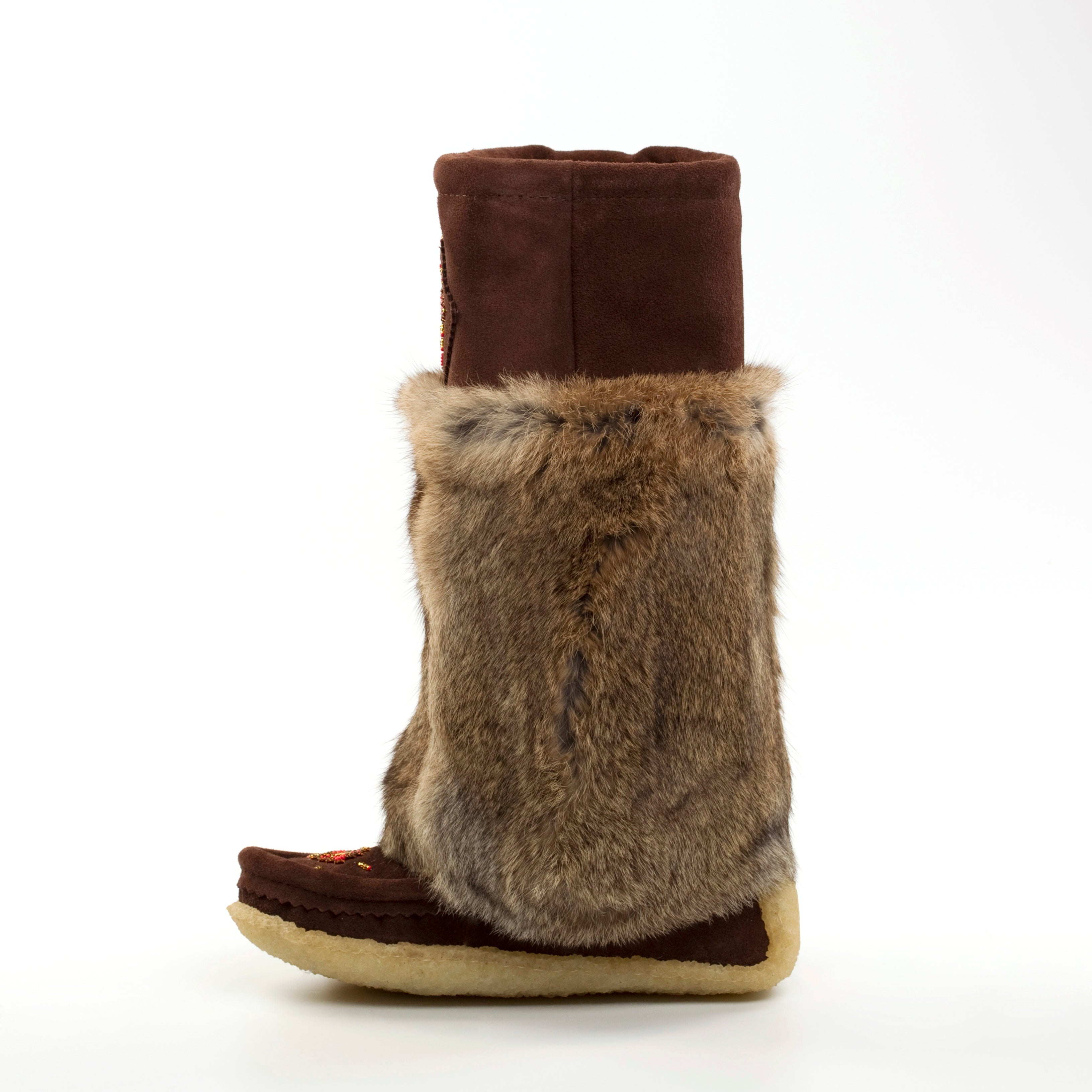 Brown boot with fur trim on a white background