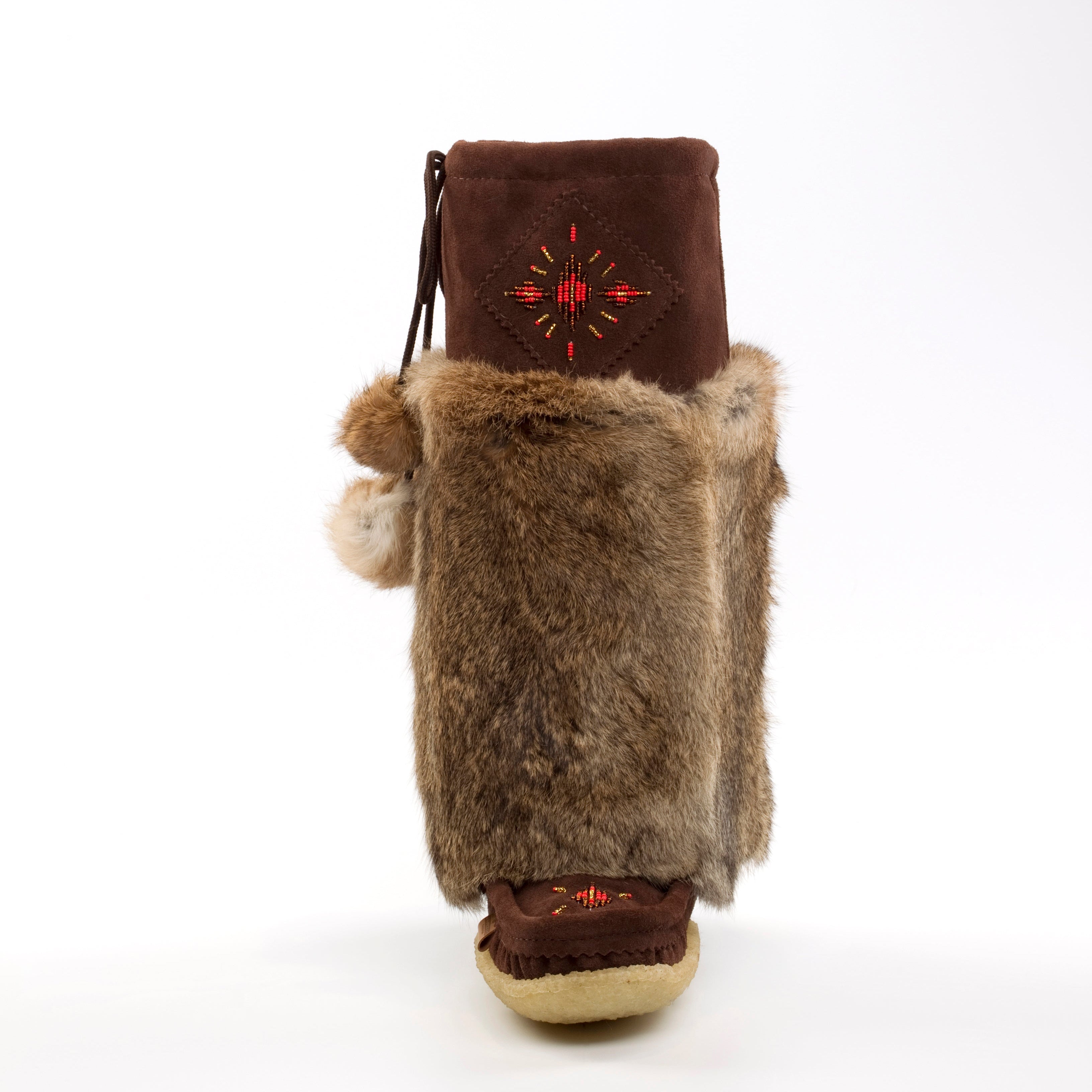 Brown boot with fur trim and embroidered design on a white background