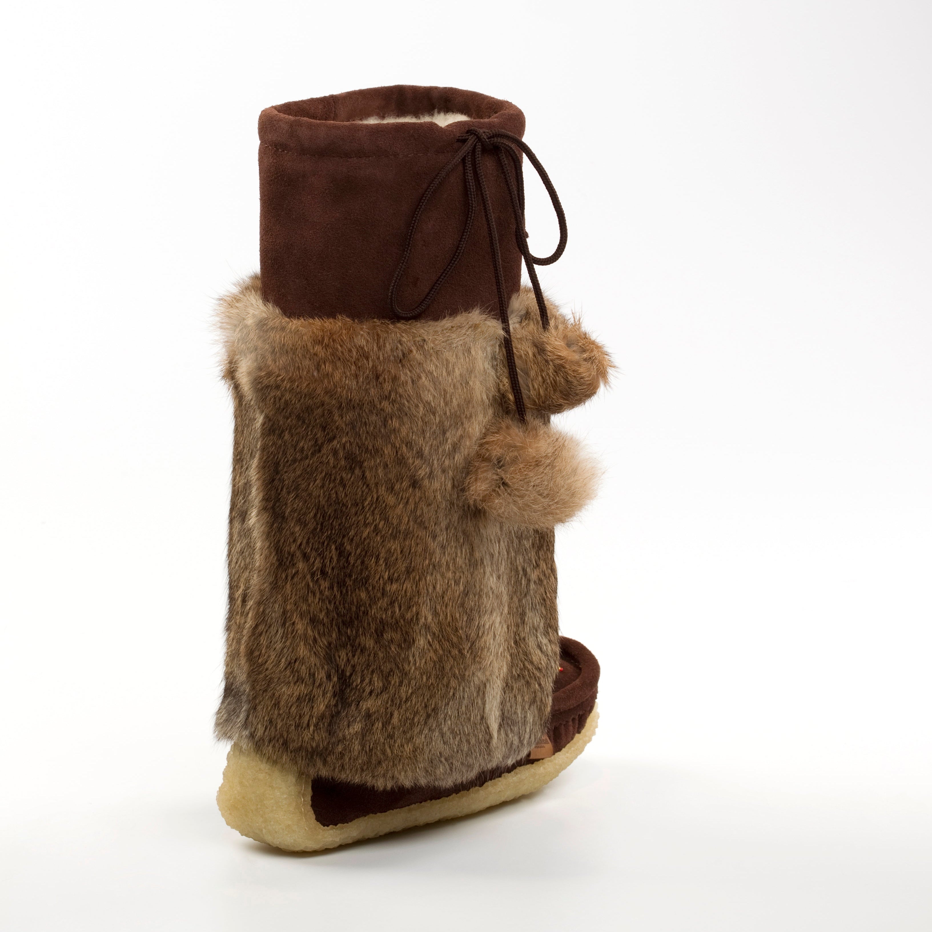 Brown fur boot with a white background