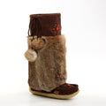 Brown furry boot with decorative top on a white background