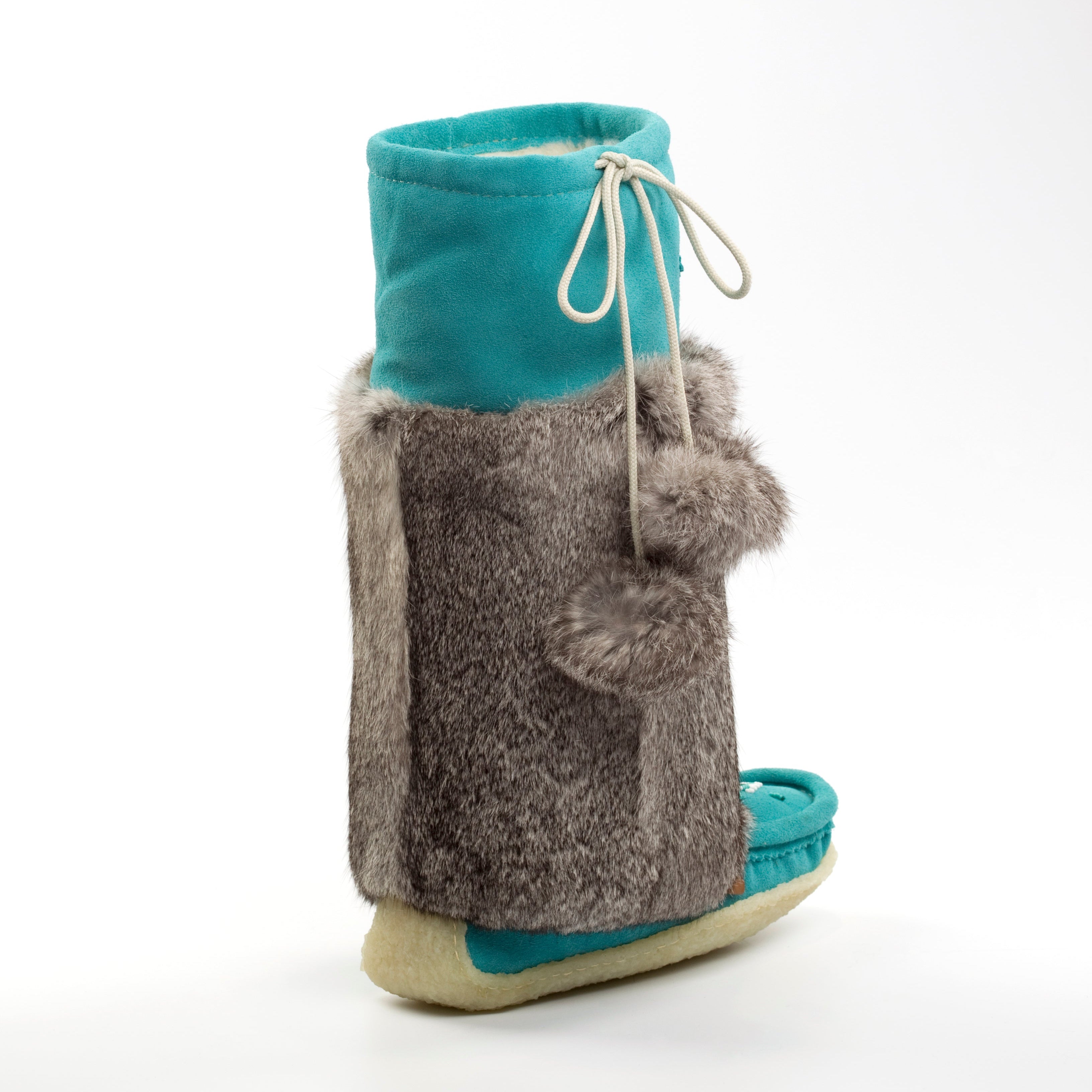 Teal and gray slipper with fur trim on a white background