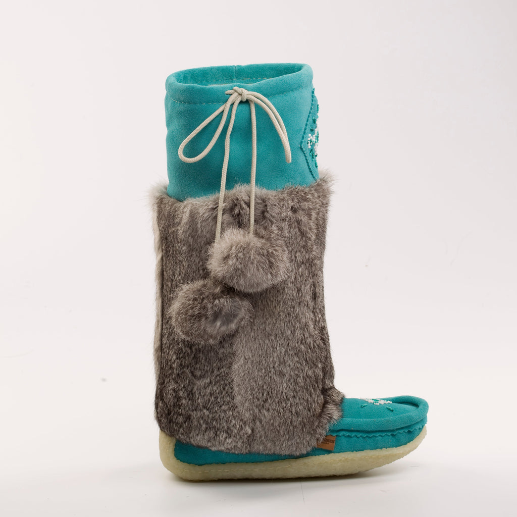 Teal and gray mukluk boot on a white background