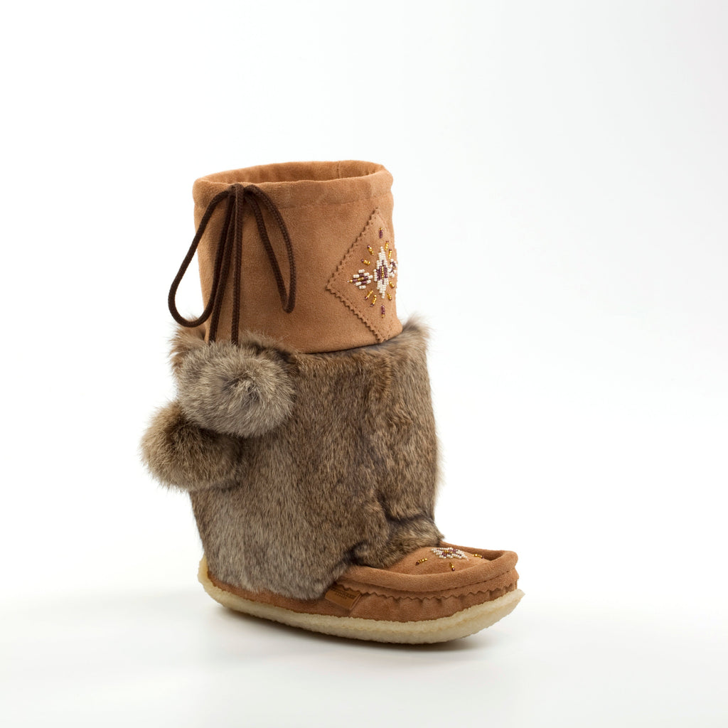 Brown suede short mukluks with fur trim and decorative elements on a white background