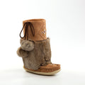 Brown suede short mukluks with fur trim and decorative elements on a white background