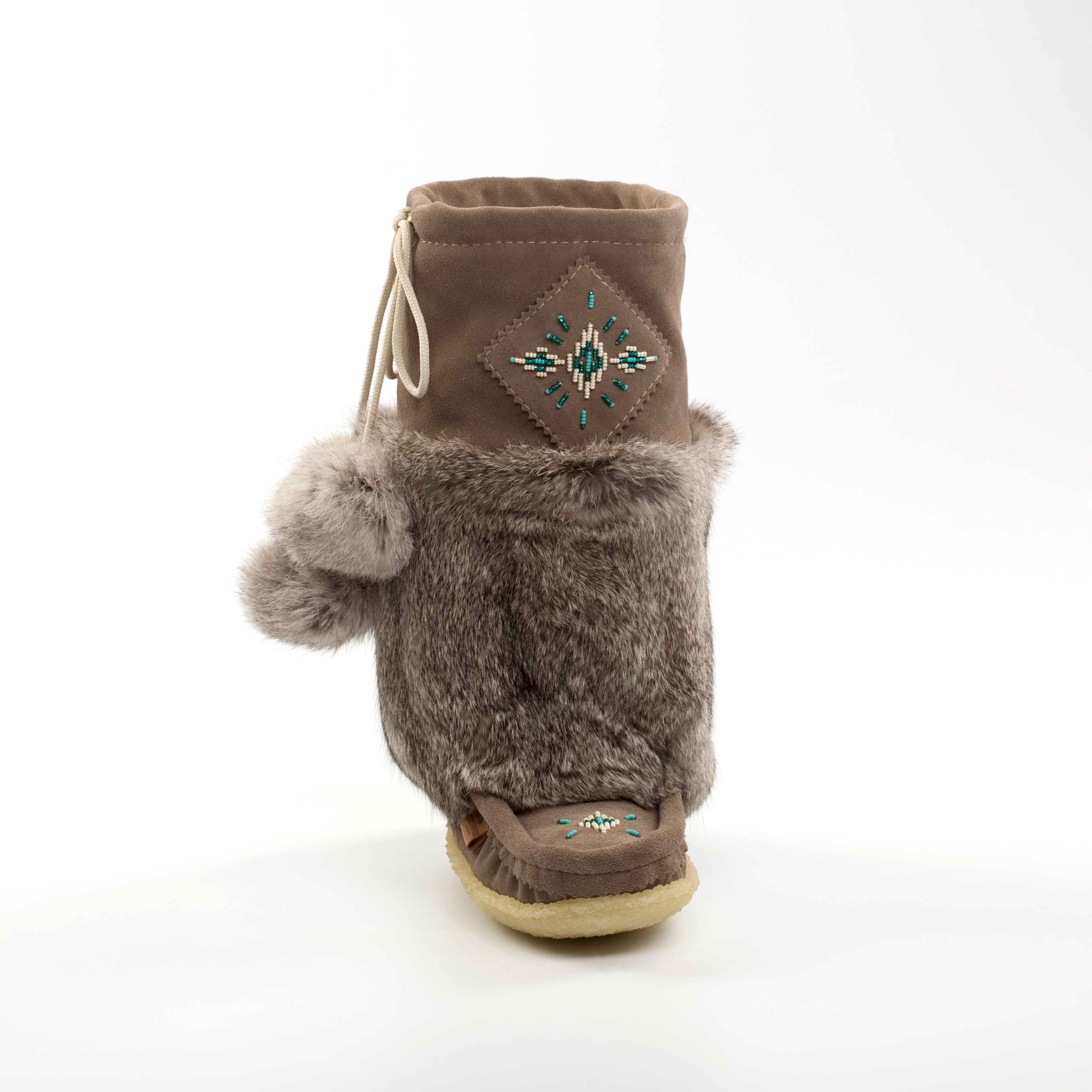 Short grey furry mukluks with embroidered design on a white background