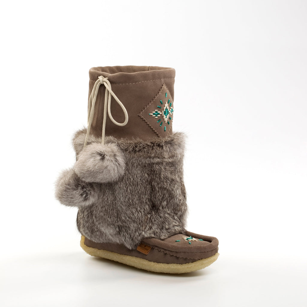grey boot with grey fur trim and decorative patch on a white background