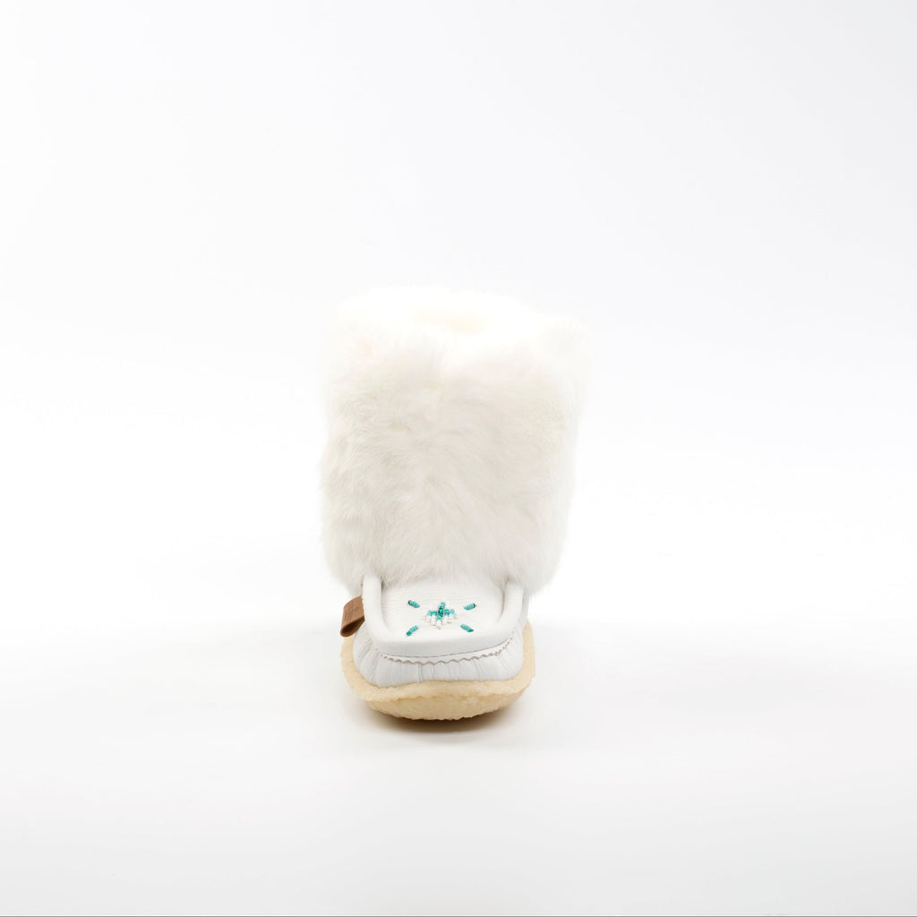 White mini mukluks with Turquoise beaded vamp on a white background