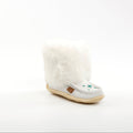 White mukluk with a cream sole on a white background