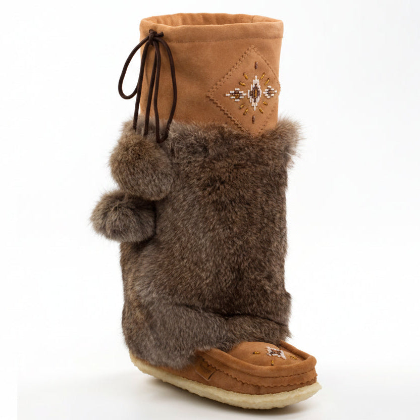 Brown boot with fur trim on a white background