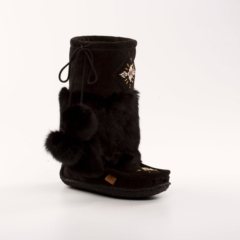 Black Canadian made mukluk with fur trim on a white background