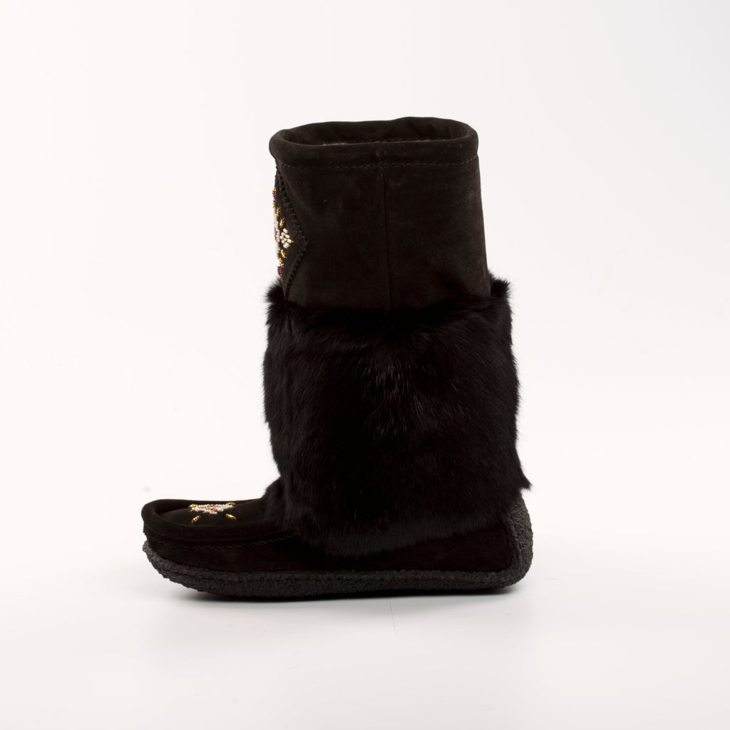 Black mukluks with fur trim on a white background