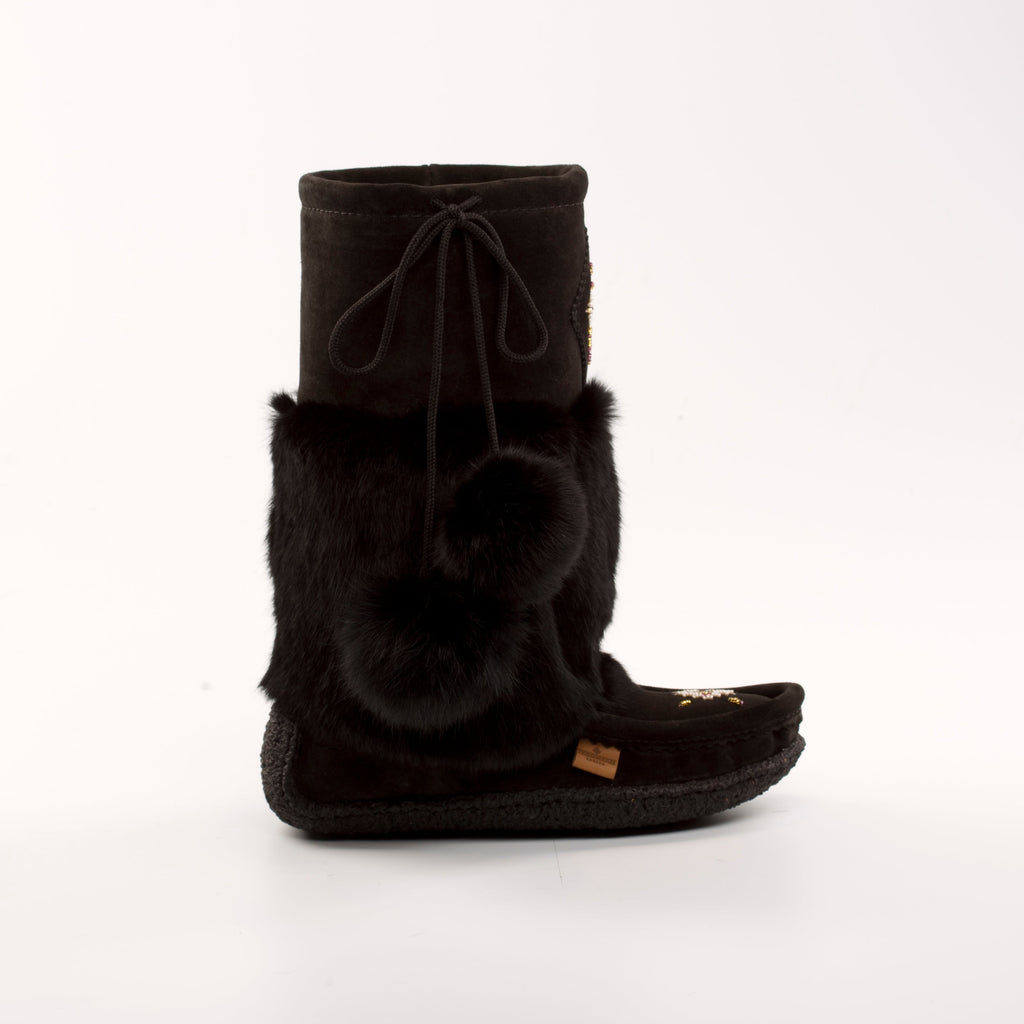Black fuzzy mukluk boot with fur trim on a white background
